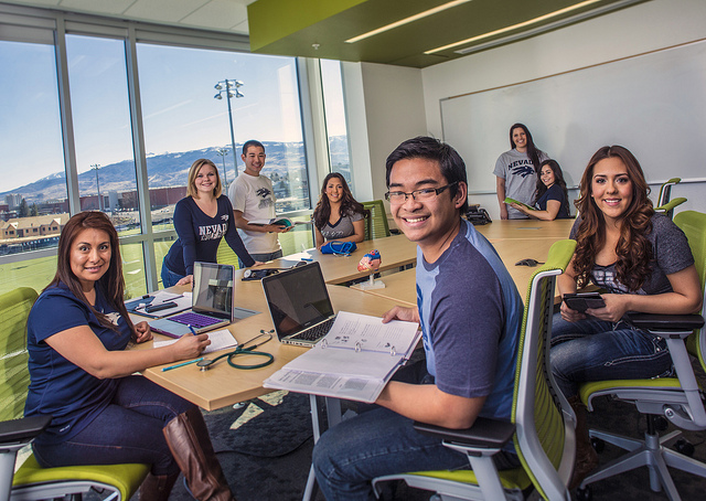 A group of students sitting around a table